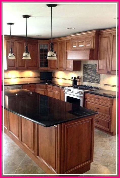 dark oak kitchen cabinets with stainless steel countertop|white quartz with oak cabinets.